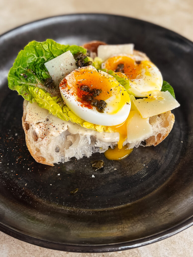 We made a salad into a sandwich! We proudly present the Caesar Salad toast on sourdough, topped with a perfect soft-boiled egg.  