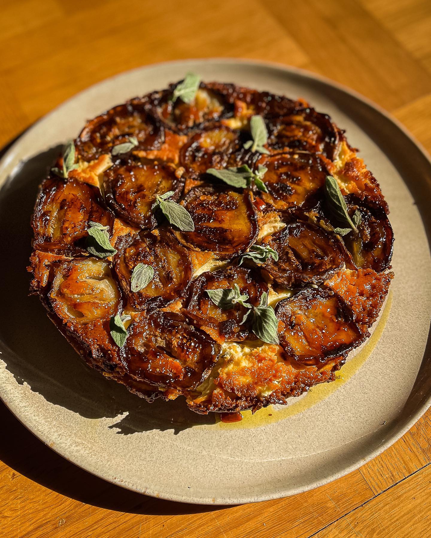 We made a saganaki-inspired-eggplant-feta-tarte-tartin with filo, hot honey, and oregano. The tarte is long gone but the recipe is coming soon. 
.
.
#tartetatin #eggplant #saganaki #recipeoftheday #feta #fetacheese #hothoney #filo #tarte #recipes #oregano